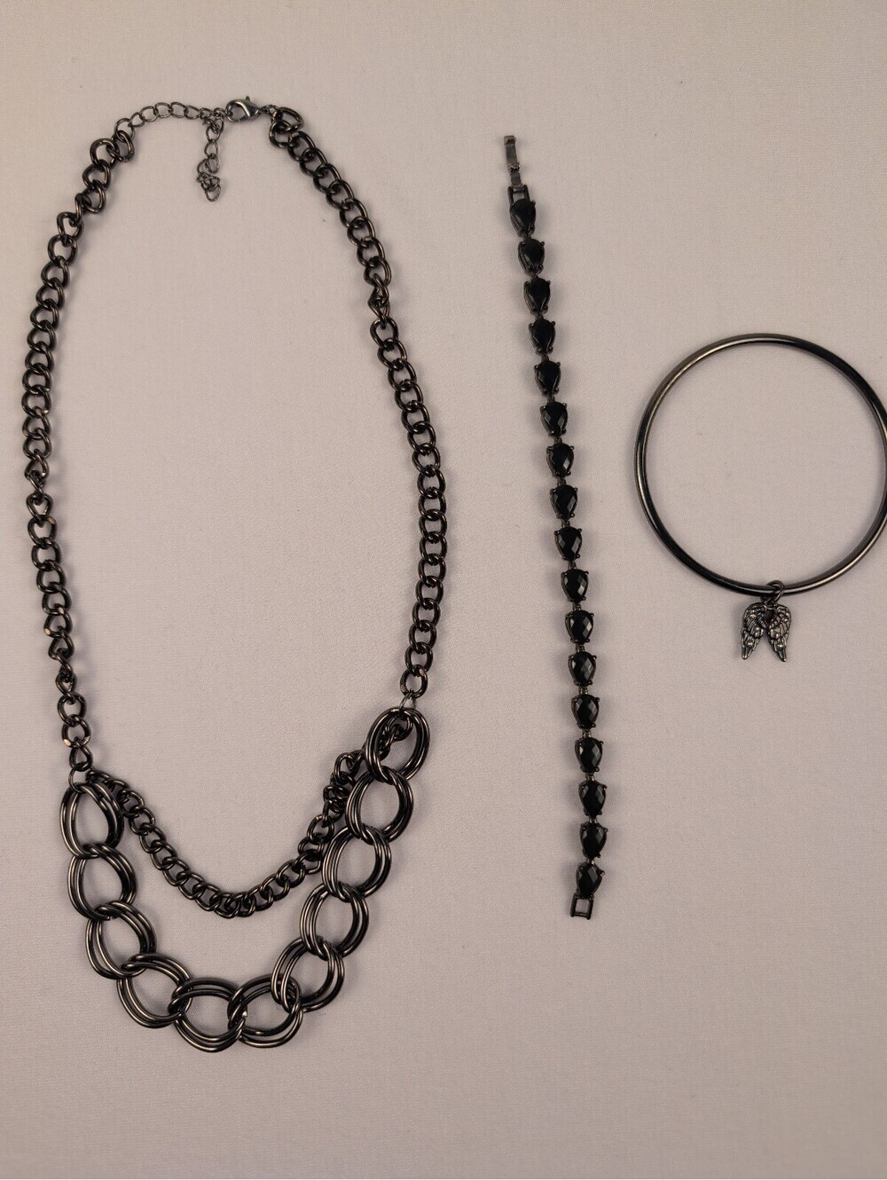 Black Multi-Piece Chain and Charm Bracelet Set